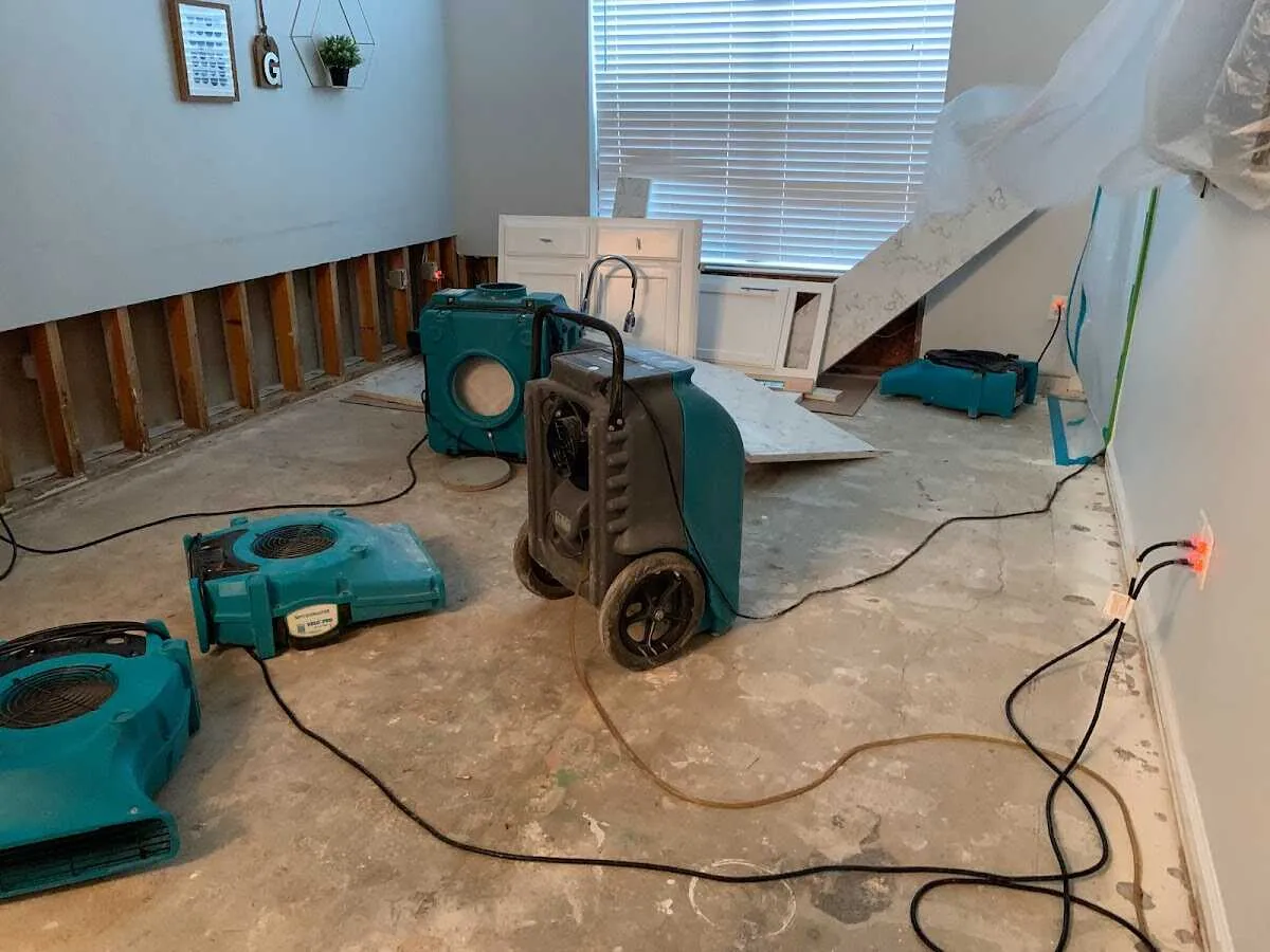 Dehumidifier in flood-cut room for Water Damage Restoration in Patterson